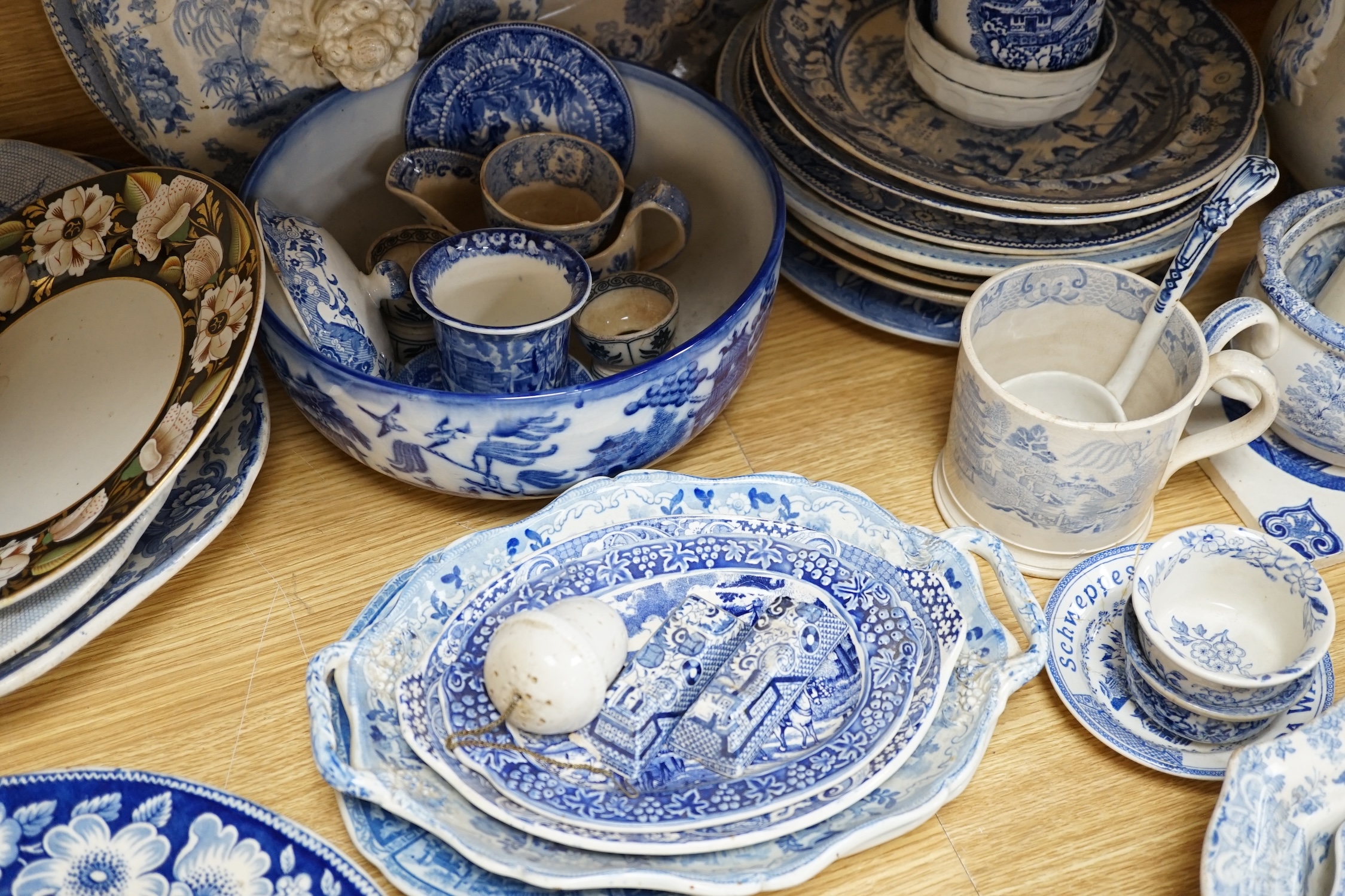 A collection of mixed blue and white dinnerware including Masons Ironstone, mostly plates and jugs. Condition - varies, poor to fair